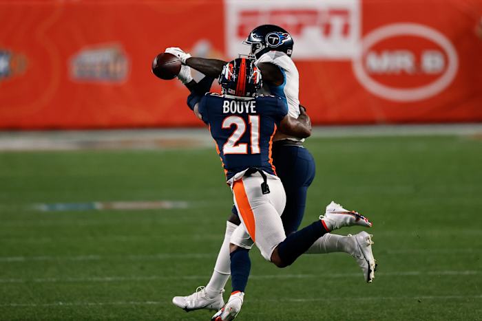 Sep 14, 2020; Denver Broncos cornerback A.J. Bouye (21) breaks up a pass intended for Titans receiver A.J. Brown (11). Mandatory Credit: Isaiah J. Downing-USA TODAY